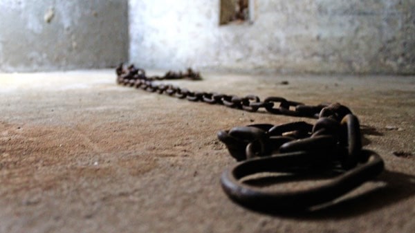 Chains used to chain African American slaves to the back wall of a church during the time of American slavery